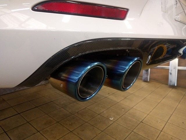 Fitted with scorched titanium tail pipes from Cargraphic